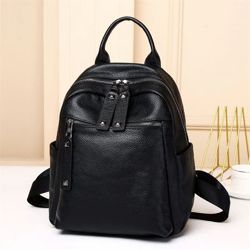 Zaino in vera pelle modello solido per donna Borse da viaggio in pelle di vacchetta nera Borsa a tracolla in pelle di mucca con rivetti di lusso