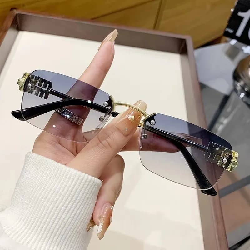 2026 New Frameless Gradient Cat Eye Sunglasses Women Square UV400 PC Material Fashion Eyewear 90291