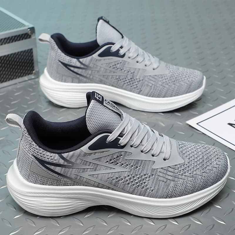 Scarpe sportive da uomo Scarpe da corsa piatte resistenti all'usura leggere estive traspiranti per uomo 2025 Nuove sneakers da jogging con lacci Uomo