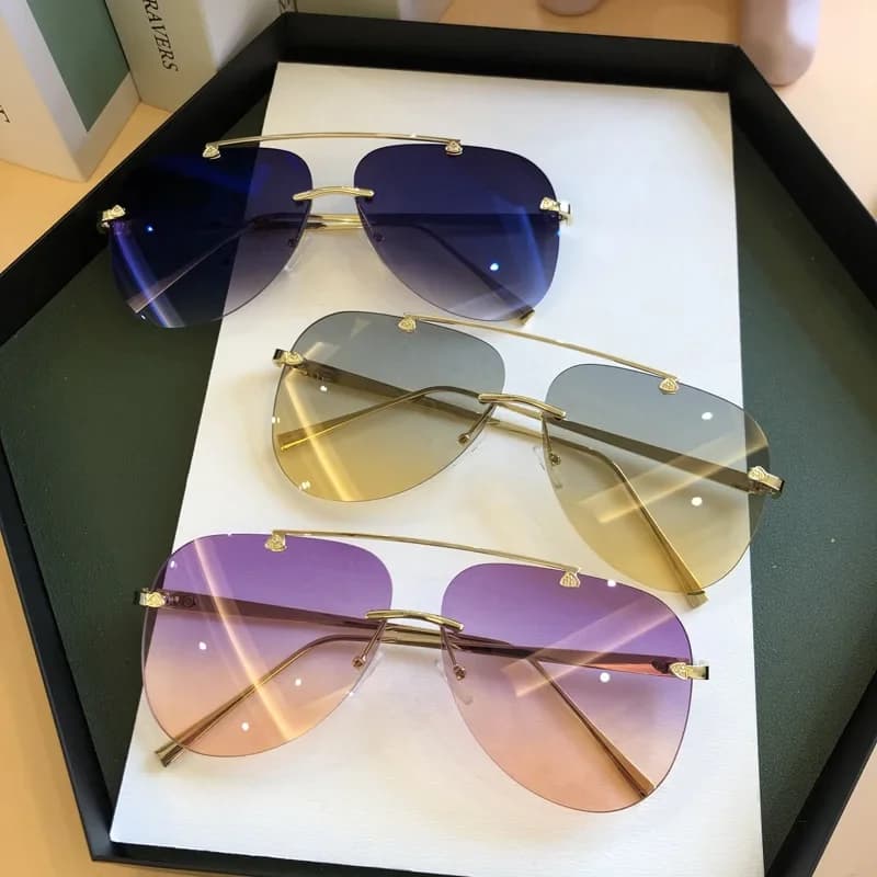Occhiali da sole vintage senza montatura in lega per uomo, occhiali da sole sfumati da aviatore, occhiali ovali in metallo da donna, neri e marroni