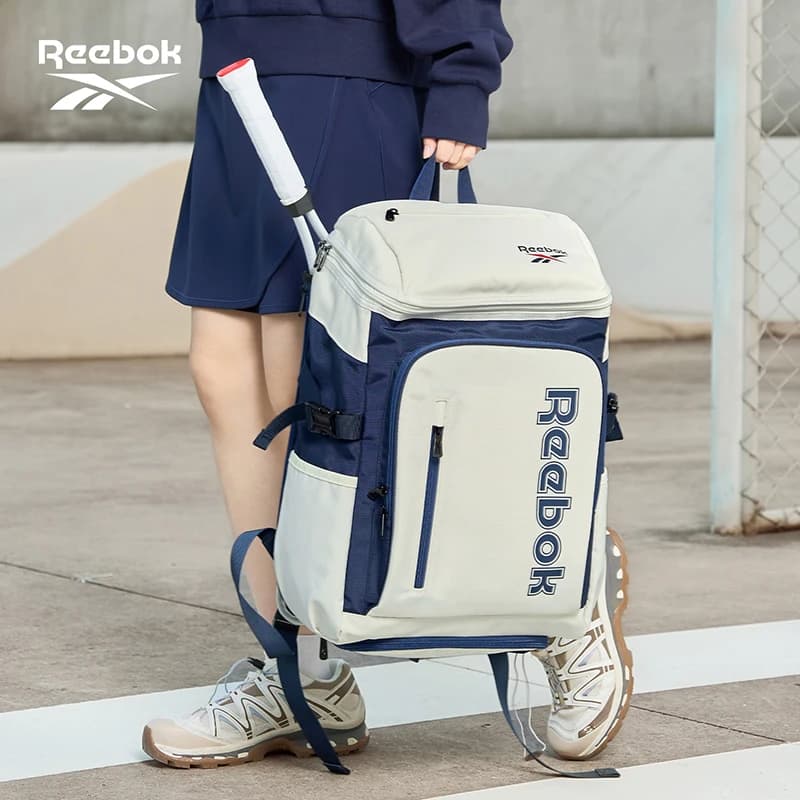 REEBOK Unisex Large Capacity Outdoor Sports Gym Backpack Independant Tennis Badminton Racket Compartment Peak Ball Knapsack