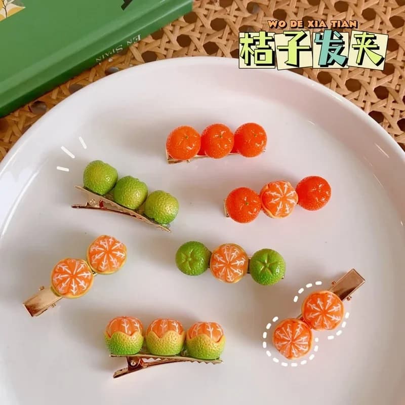 Fermaglio per capelli creativo e divertente a forma di arancia semi-sbucciata, grazioso fermaglio laterale per ragazza, fermaglio a becco d'anatra con motivo frutta giapponese, accessori per capelli di tendenza.