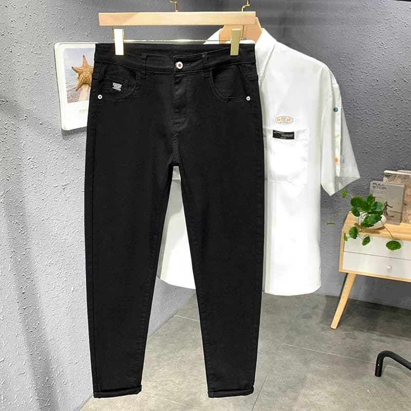 2024 primavera e autunno nuovi jeans moda casual da strada da uomo pantaloni in denim casual slim fit elasticizzati dritti uomo nero bianco