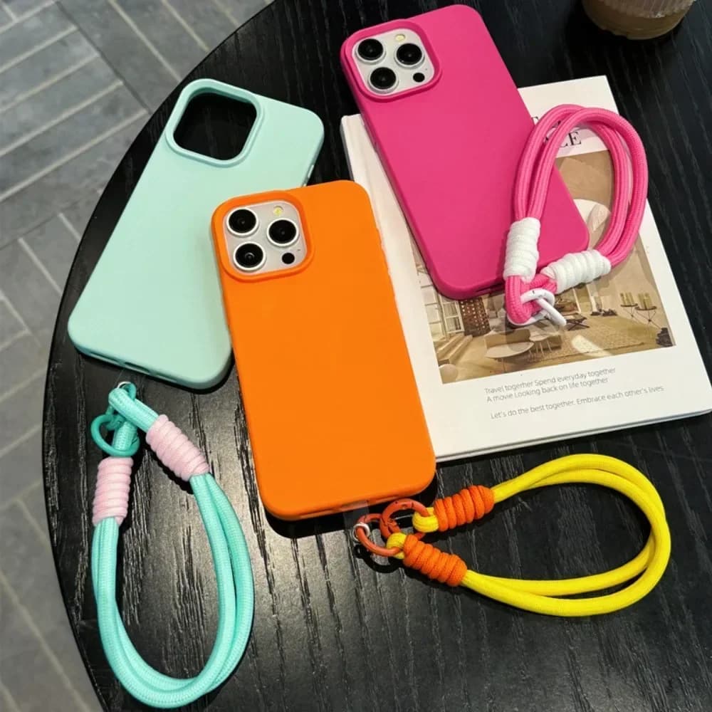 Leather textured phone case with wrist strap for iPhone 16 Pro Max 15 14 Plus 13 12 11 XS XR X Soft back cover in TPU with strap