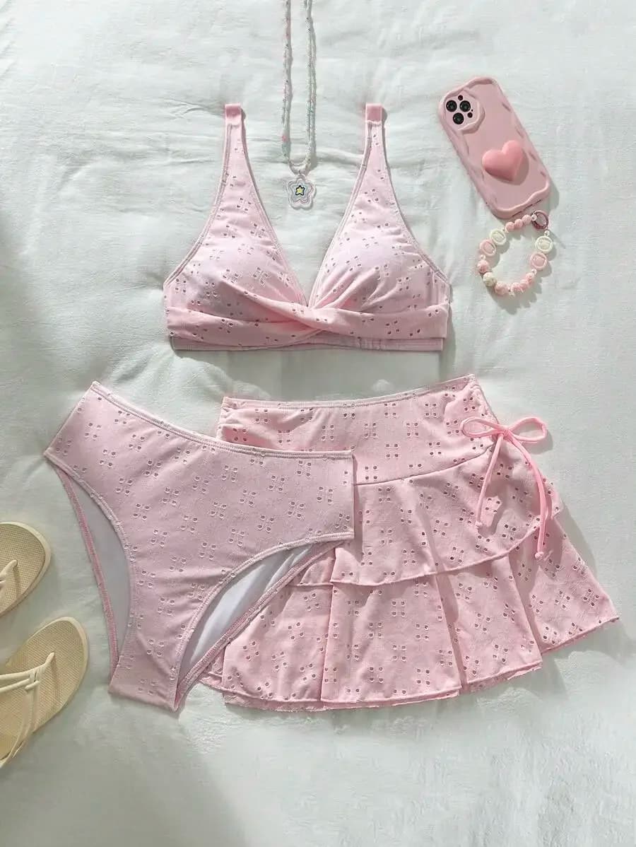 Set costume da bagno da donna in 3 pezzi rosa con top incrociato e gonna a balze