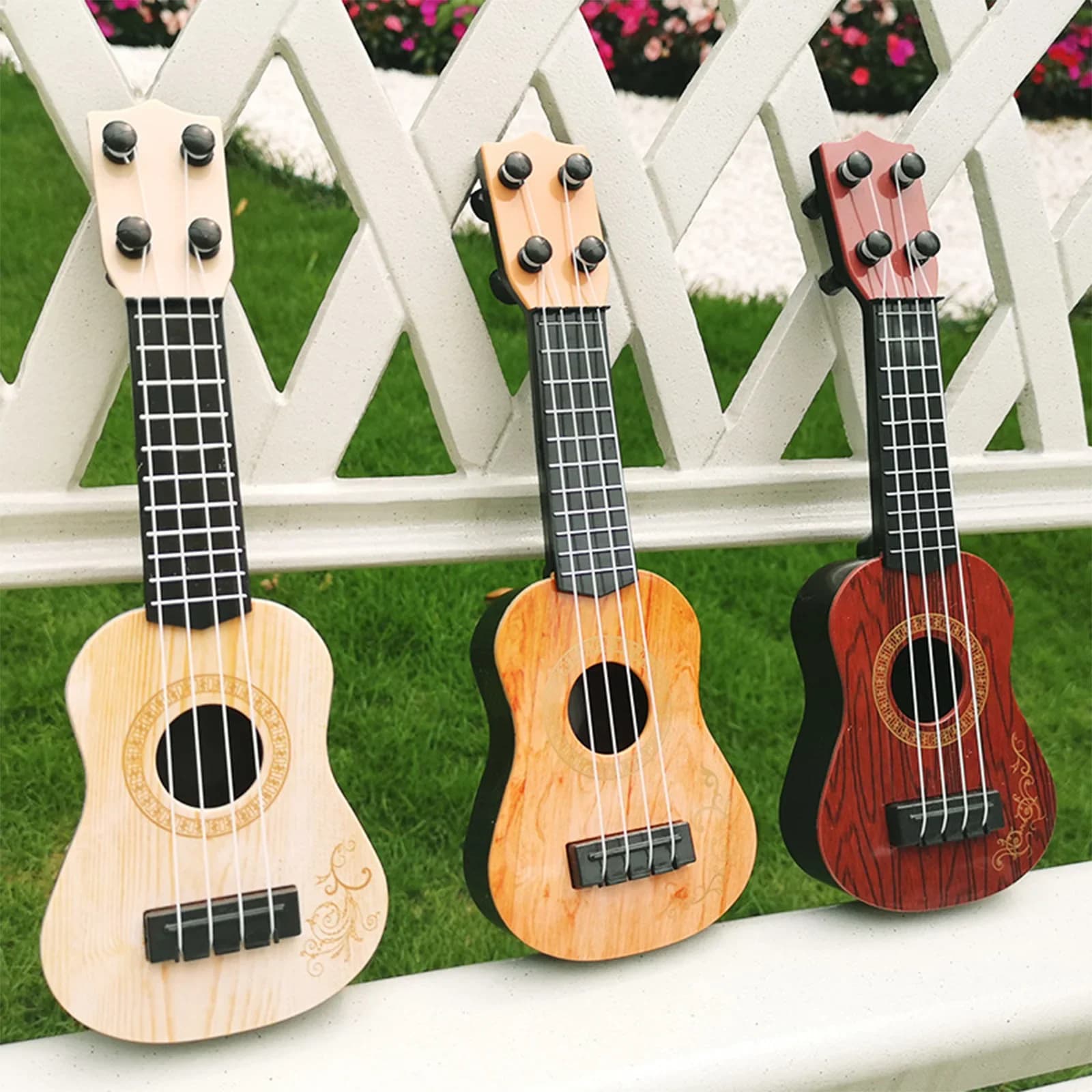 Bambini classico Ukulele chitarra giocattolo leggero prima educazione piccola chitarra forniture per feste regolabili per bambini regali di festa