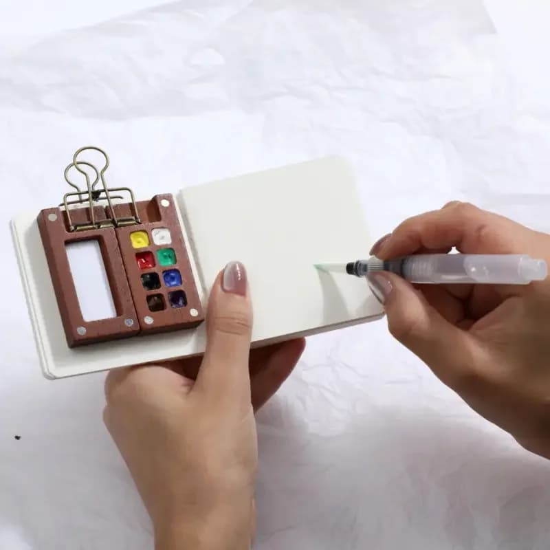 Set di acquerelli portatili Tavolozza da viaggio Quaderno per schizzi Penne a pennello Clip per raccoglitori per artisti Studenti Strumenti di pittura Forniture per disegno