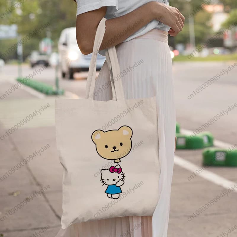 Borsa shopper riutilizzabile con stampa artistica da giardino di Hello Kitty, borsa tote in tela da donna, borsa ecologica stampata, borsa a tracolla con cartoni animati