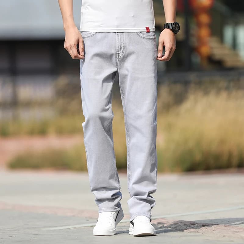 Jeans sottili larghi dritti da uomo nuovi di zecca estate 2023 abbigliamento Casual semplice Jeans grigio chiaro elasticizzati in cotone leggero