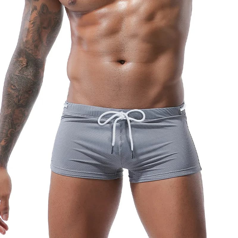 Costume da bagno da uomo estivo 2026, sexy, ad asciugatura rapida, slip da nuoto, pantaloncini sportivi traspiranti per la spiaggia e il surf