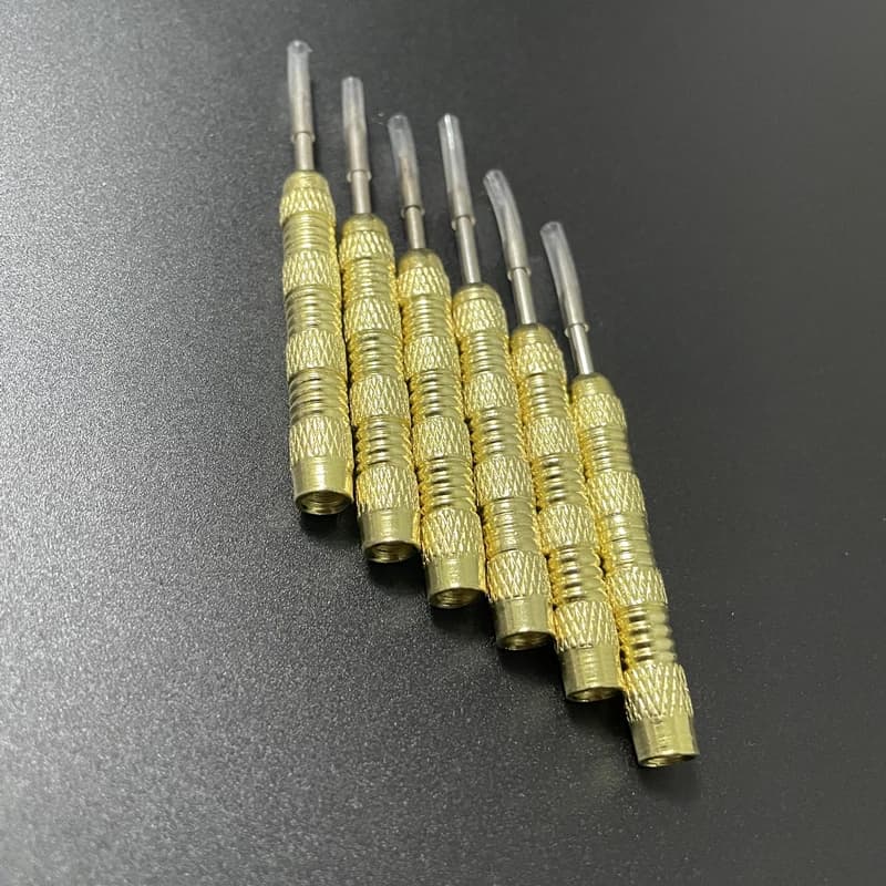 12 dart needles 12g/0.46 ounces exquisitely carved yellow pattern iron material electroplating process accessories steel tips