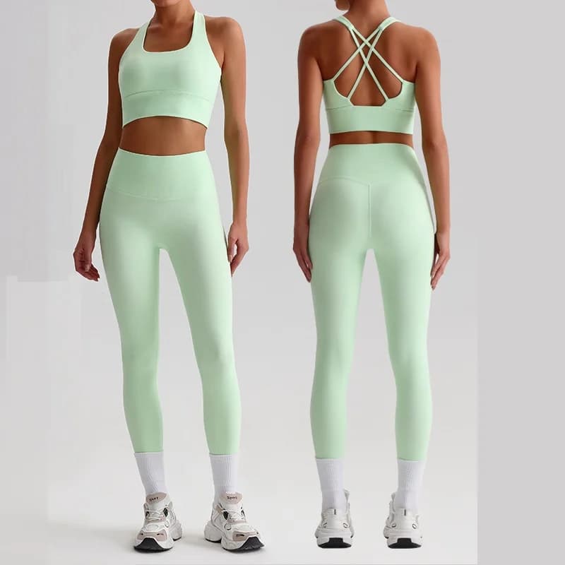 Set da yoga in tinta unita Leggings attillati Sport Fitness Cross Reggiseno da palestra Top 2 pezzi Tuta sportiva morbida Allenamento per abbigliamento sportivo da donna