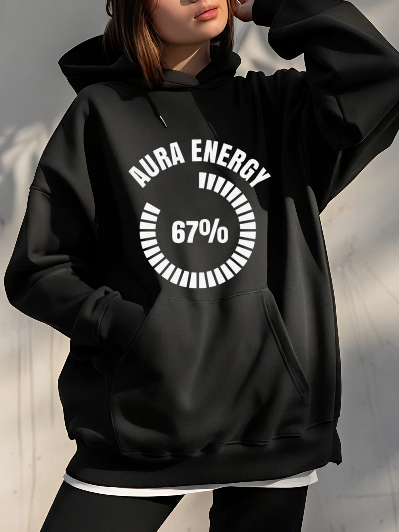 Aura Energy Load Indicator hoodie with circular graphic design for streetwear urban style