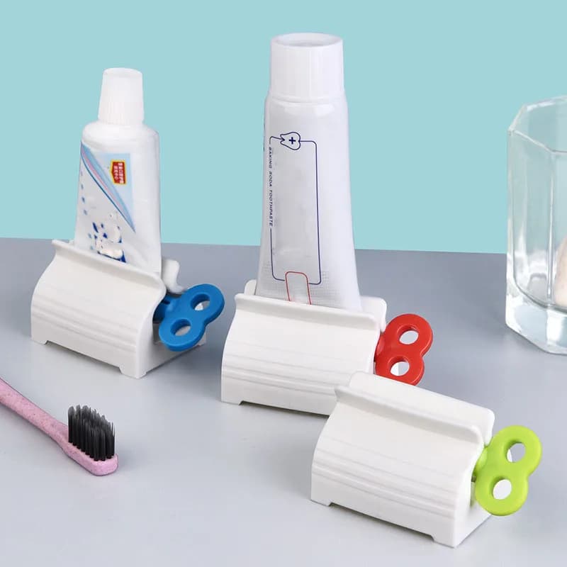 1 Pc Rolling Tube dentifricio spremiagrumi dentifricio supporto per sedile ruota Dispenser di dentifricio per il bagno