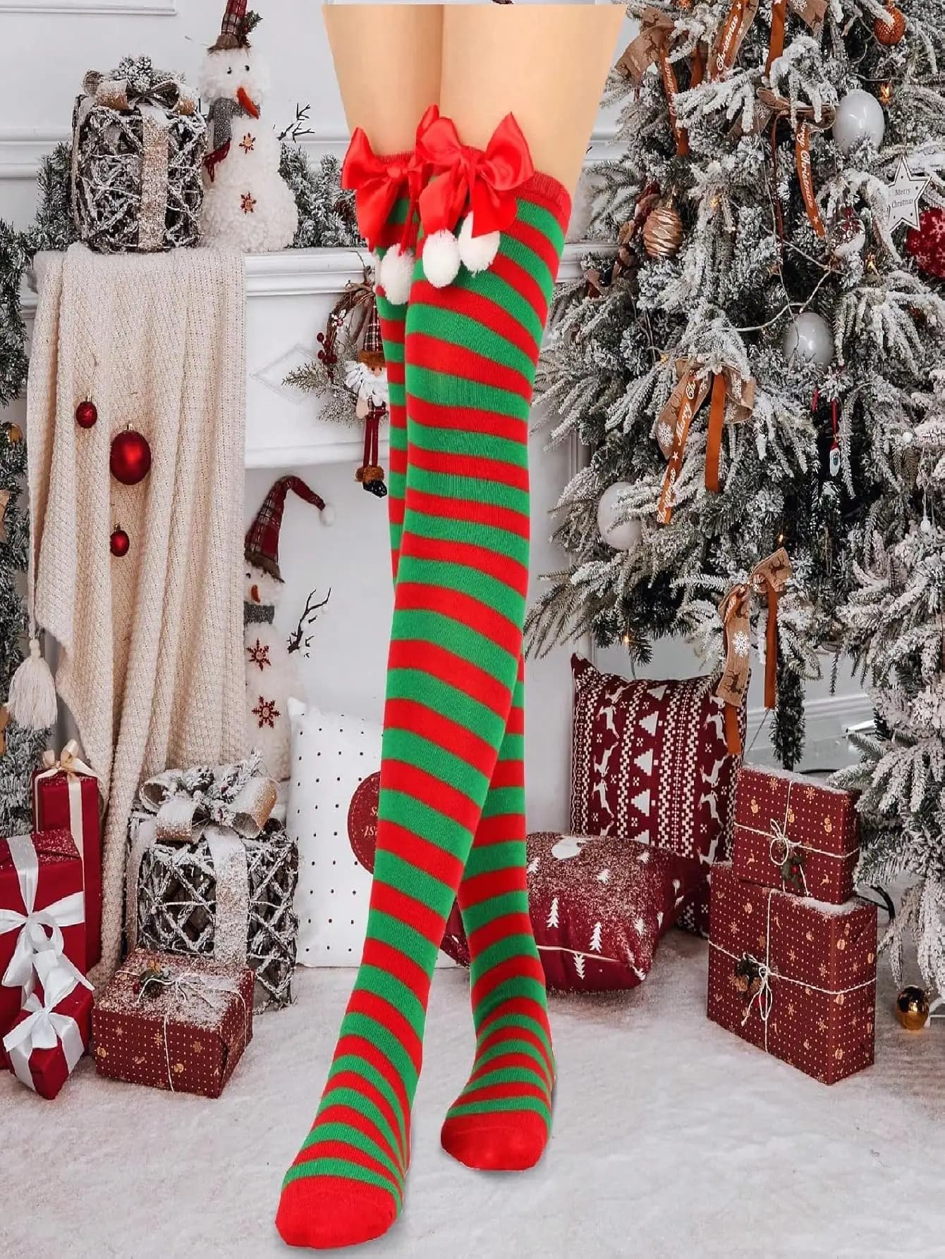1 pair of high christmas socks up to the woman's thigh: bow, pompon and stripes - comfortable essential for the winter