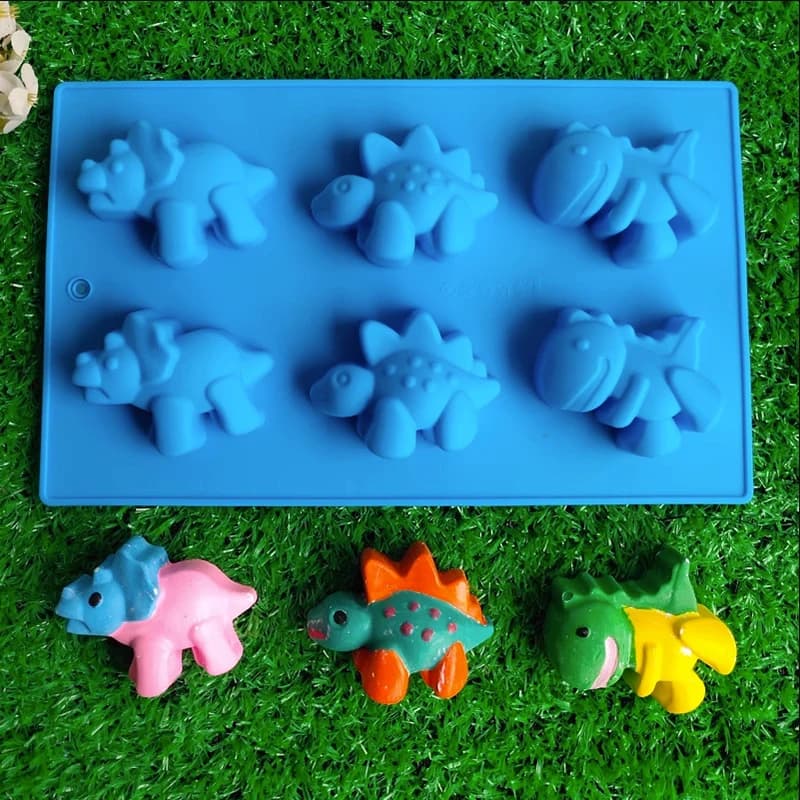 Stampo in silicone per caramelle di dinosauro Stampo per cioccolato Dino per vassoio per cubetti di ghiaccio Sapone per cartoni animati Forniture per pastelli Dolcetti per resina per feste