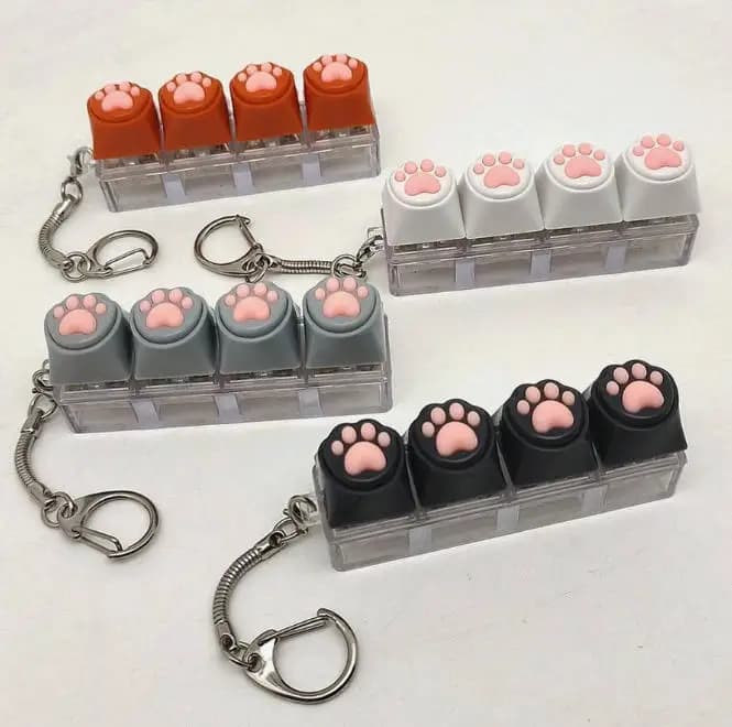 Giocattolo Antistress a Lenta Risalita a Forma di Tastiera, 1 Pezzo, con Portachiavi in Silicone Morbido a Forma di Zampa di Gatto, Ciondolo