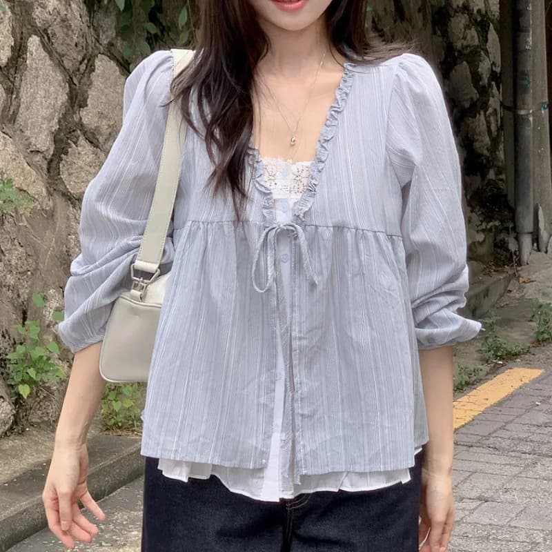 Camicetta blu da donna con scollo a V e volant, top peplum con maniche lunghe a sbuffo e laccetti sul davanti, camicia casual estiva