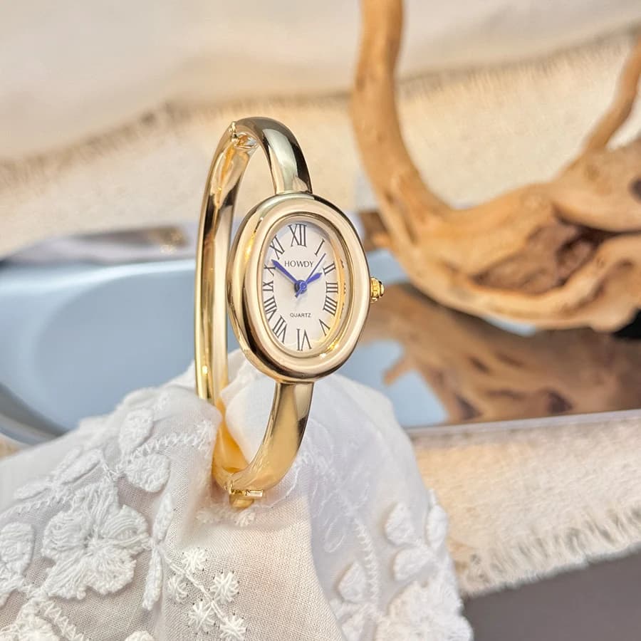 Nuovo stile braccialetto per vasca da bagno quadrante piccolo orologio al quarzo ovale con numeri romani di fascia alta da donna di lusso leggero squisito e unico