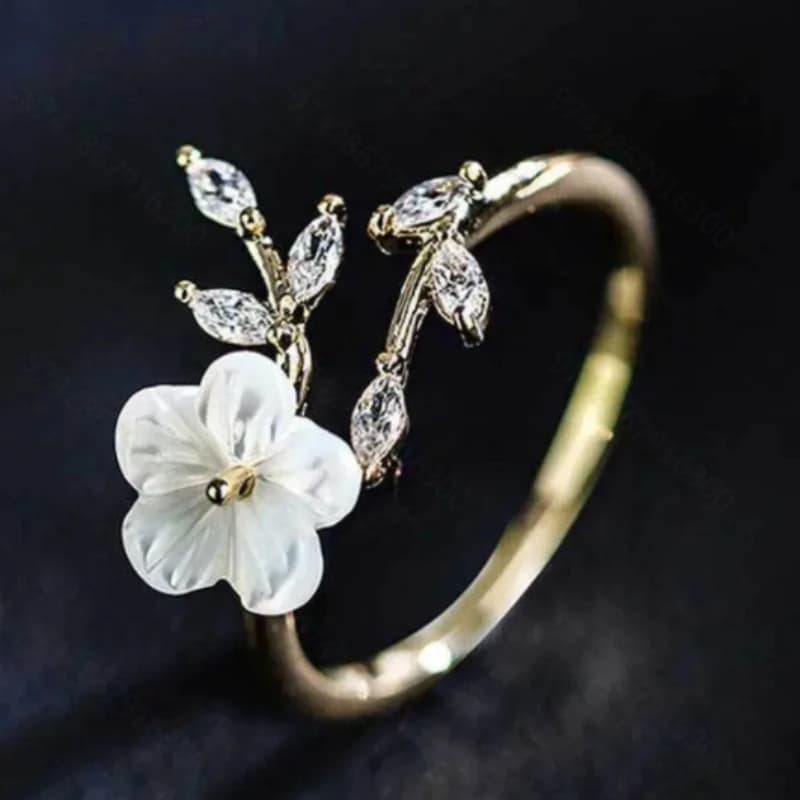 Anello regolabile con apertura floreale di temperamento di lusso leggero alla moda per le donne Gioielli per banchetti con zirconi intarsiati delicati e brillanti