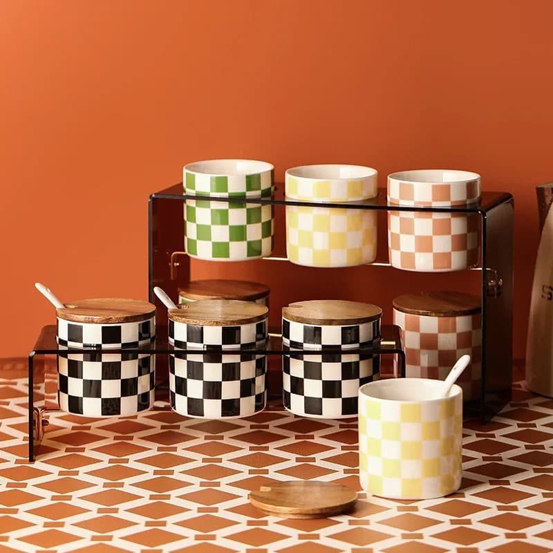 Set di barattoli per condimenti a scacchiera in ceramica per la casa scaffale per condimenti in acrilico combinazione di barattoli per condimenti scatola per condimenti di lusso leggera con coperchio