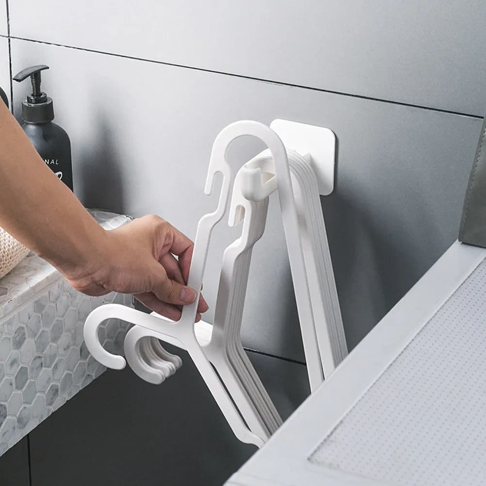 2Pcs Wall Mounted Clothes Hanger Organizer Adhesive Storage Racks Hanger Holder Non Punch Hook for Closet Laundry Room Storage