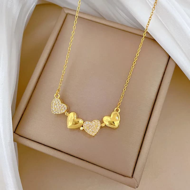 Collana da donna in acciaio al titanio con catena a lucchetto a cuore che incastro i gioielli con catena a clavicola con quadrifoglio Nuovo stile versatile
