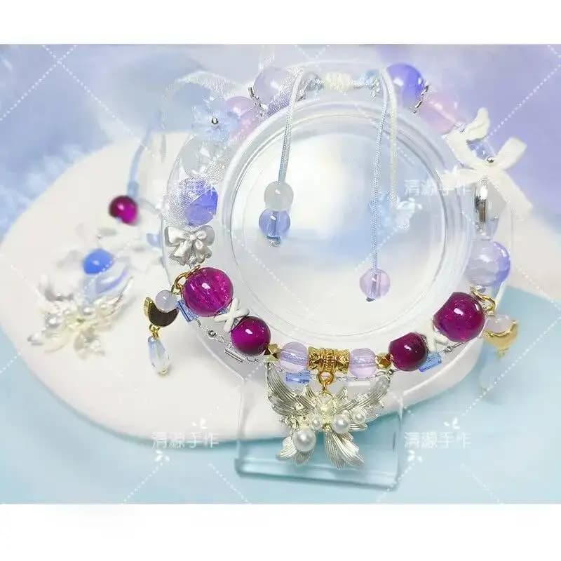 Braccialetto Genshin Impact Columbina con Eleganti Perle di Cristallo, Fatto a Mano con Corda Elastica, Gioiello da Donna per Compleanno