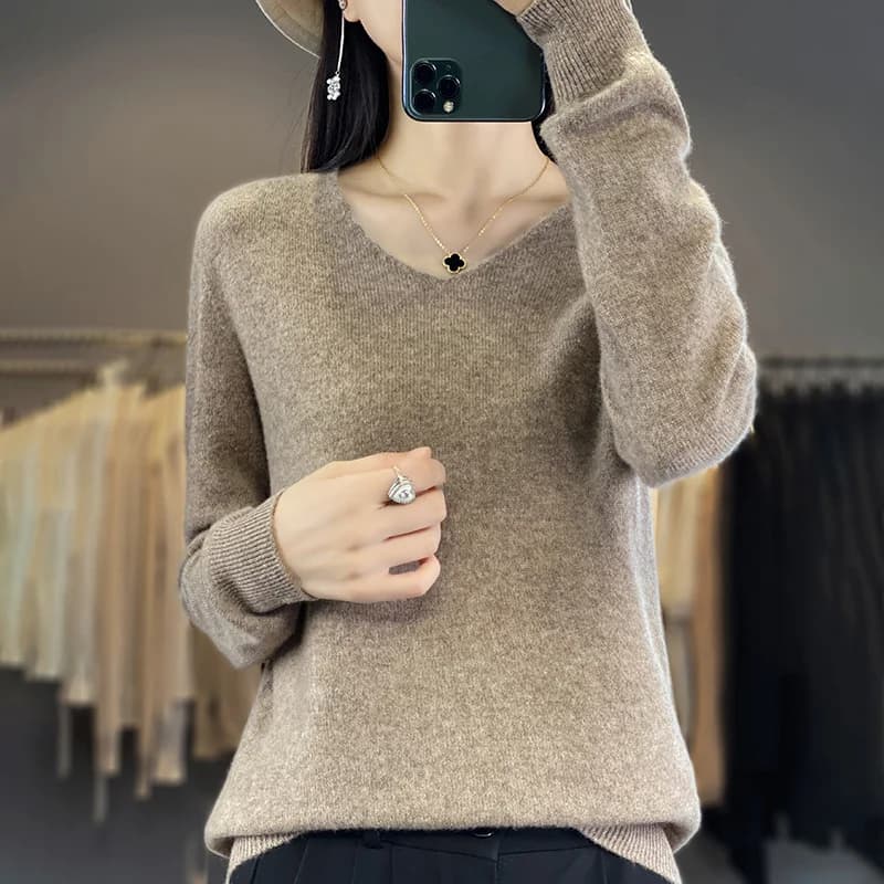 Articolo di abbigliamento monopezzo alla moda versatile in tinta unita con scollo a V da donna 100% lana