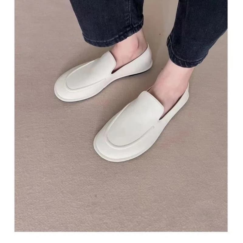 25 anni di scarpe singole casual piatte in pelle minimalista nordica, mocassini con un piede