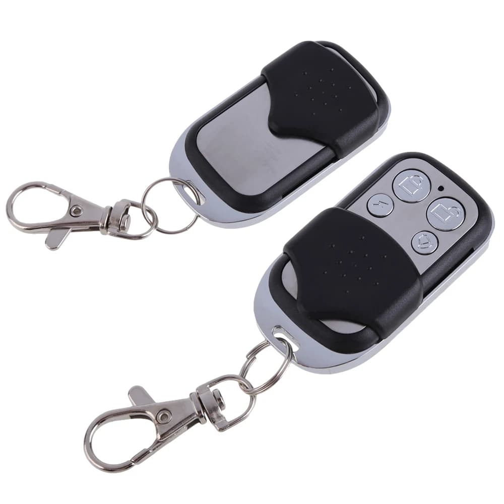 Telecomando universale 433MHz per cancelli e garage, ricambio per apriporta auto e cancelli.