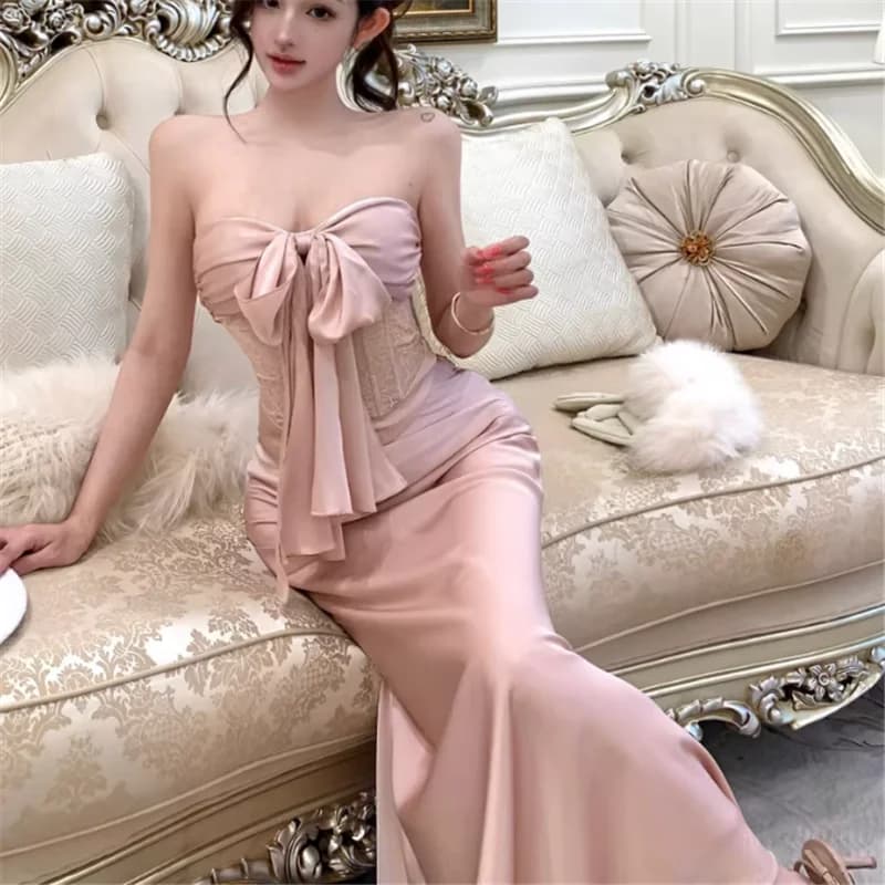 Complete two-piece pink girl, new sexy summer set with bandeau top with bow and long high-waisted mermaid skirt in shiny satin, complete 2 pieces