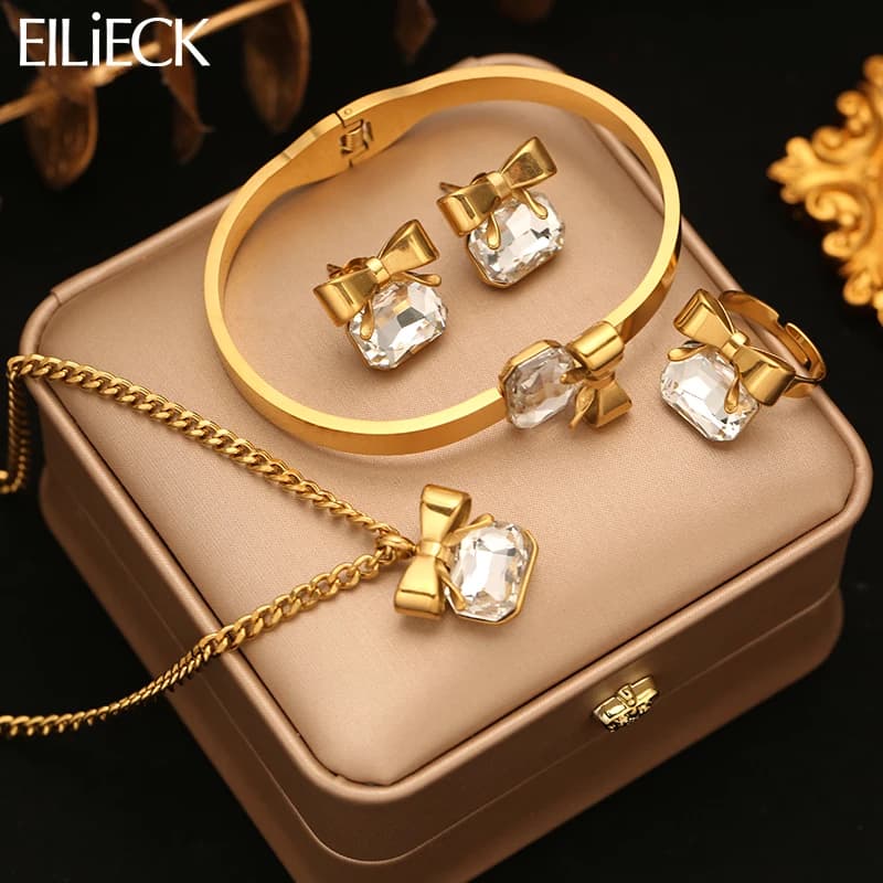 EILIECK Golden Stainless Steel Metal Bowknot Sparkling Crystal Necklace Bangle Earrings Ring Trendy Jewelry Set For Women Gift