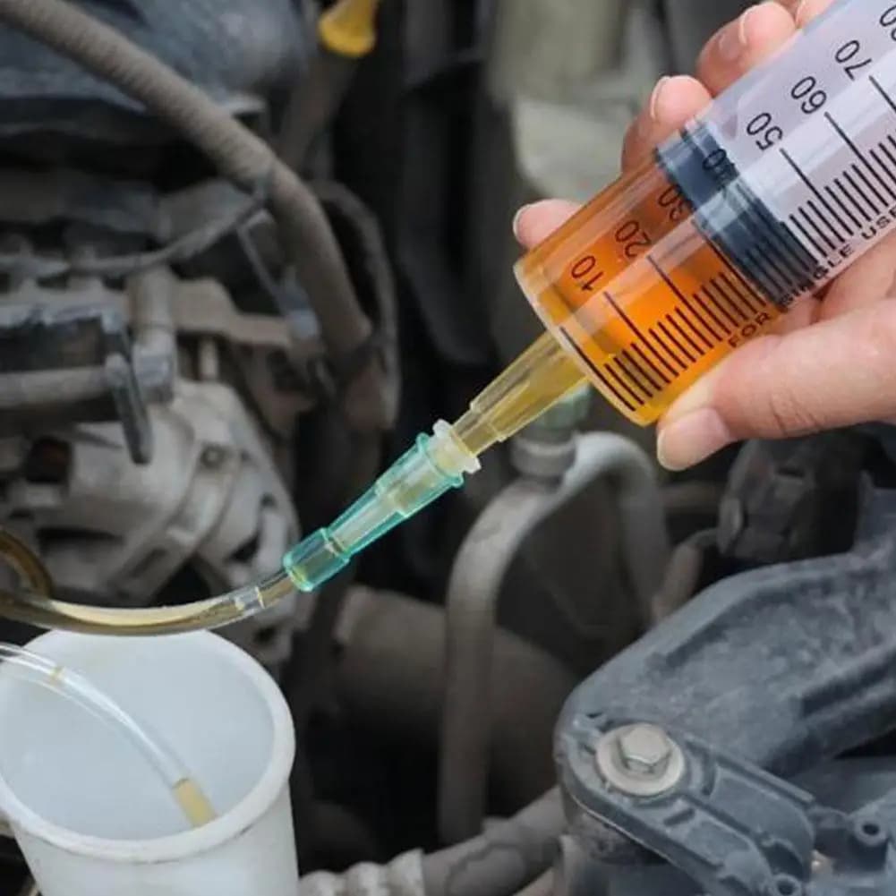 Pompa a Siringa per Olio da 550ml, Estrattore di Fluidi per Auto con Tubo, Pompa di Aspirazione Manuale a Vuoto