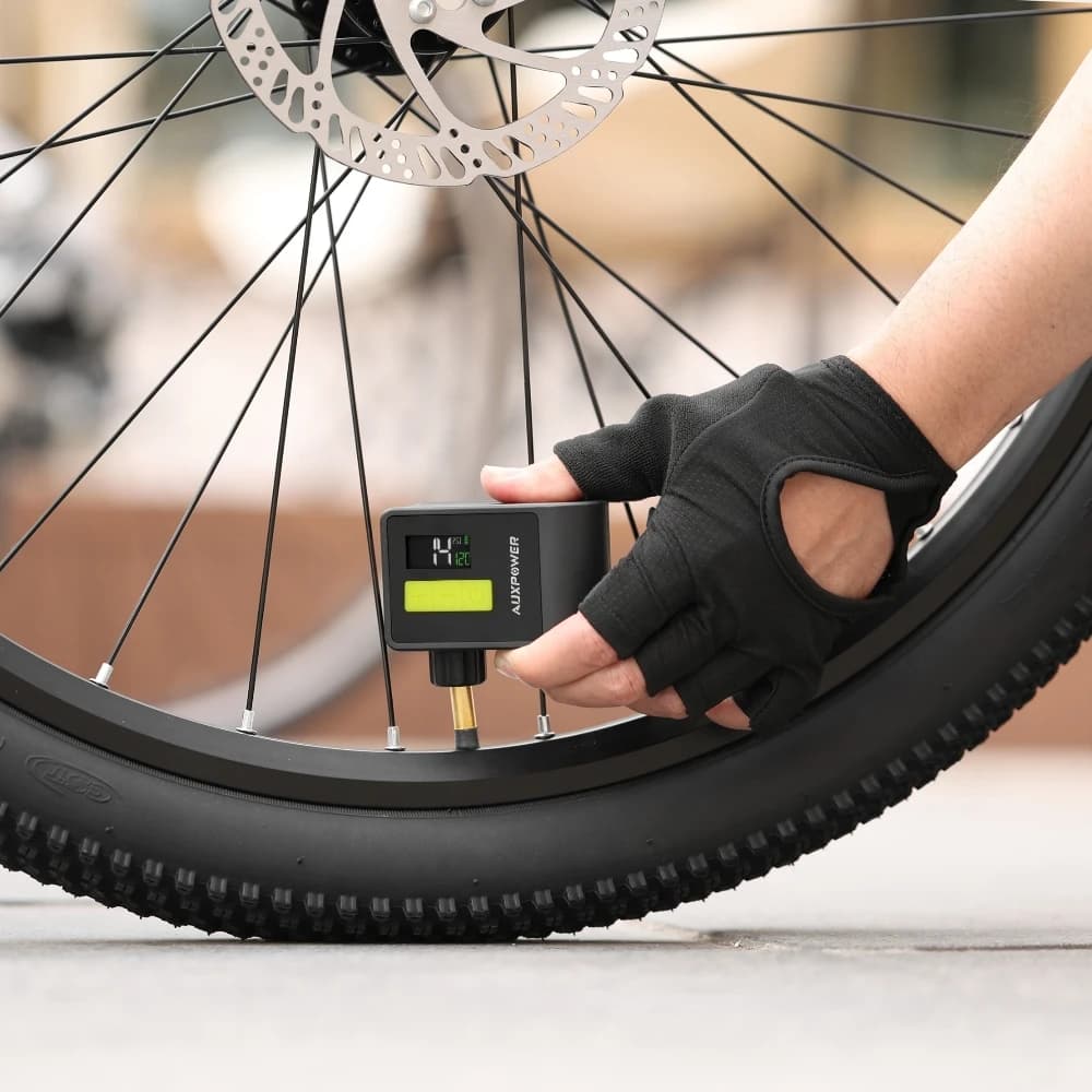 Mini pompa d'aria elettrica 120PSI Arresto automatico 1000mAh Gonfiatore digitale leggero con luce a LED per compressore di pneumatici per bici da moto