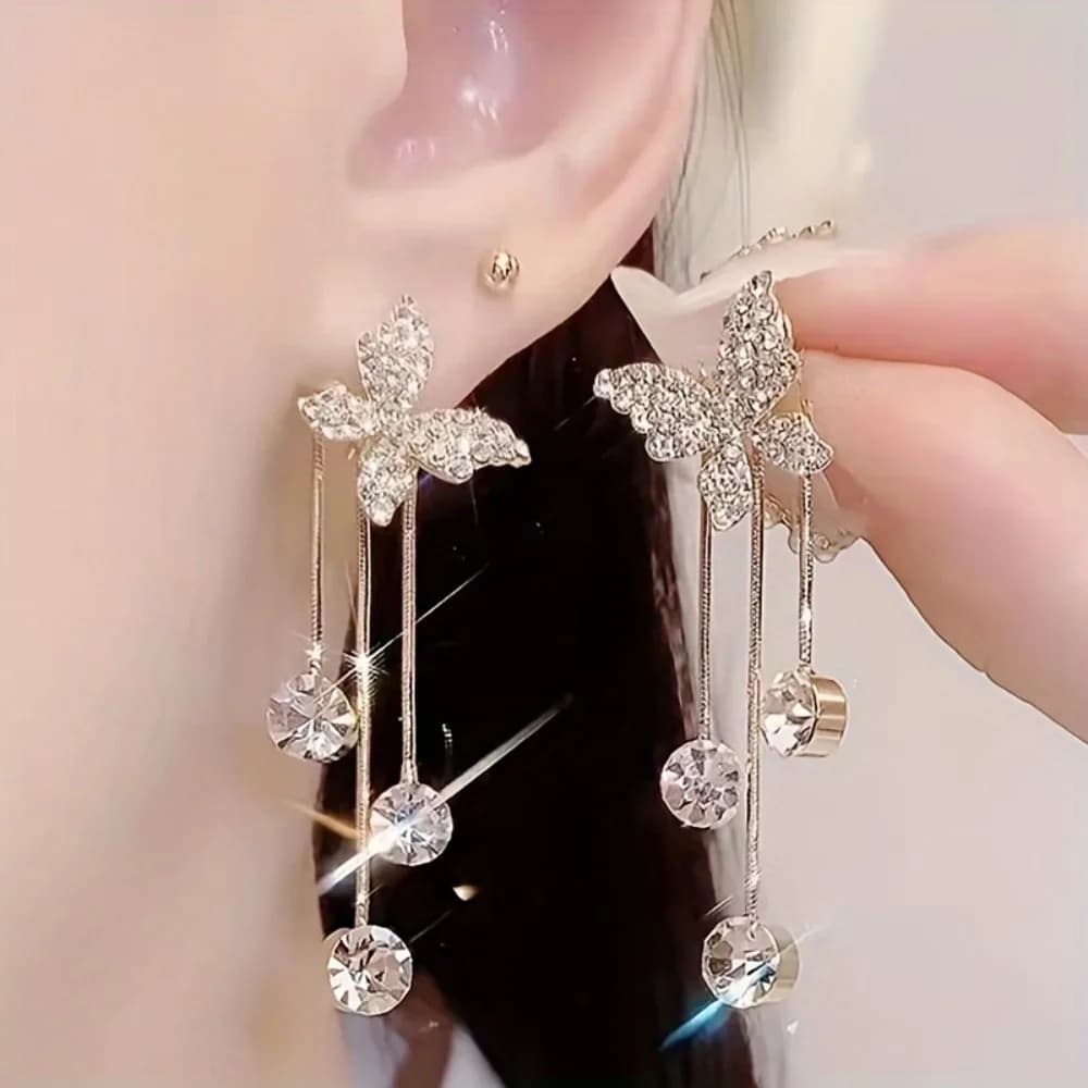 A pair of stylish, high-end butterfly earrings featuring trendy rhinestones; charming, fresh fringe earrings; women's sparkling sequins