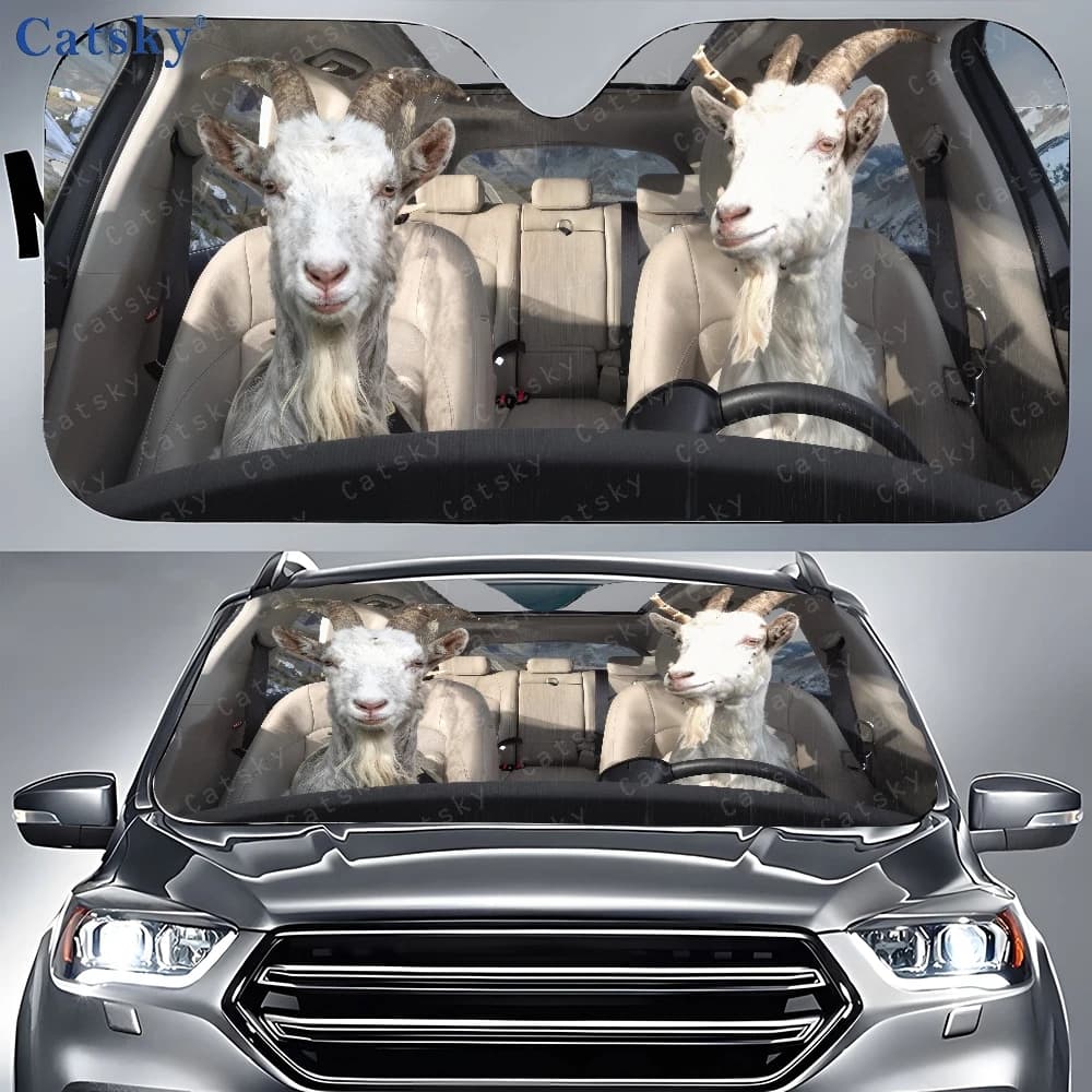 Car parasol with two goats sitting on the back seat, front window sun cover, car sunshade
