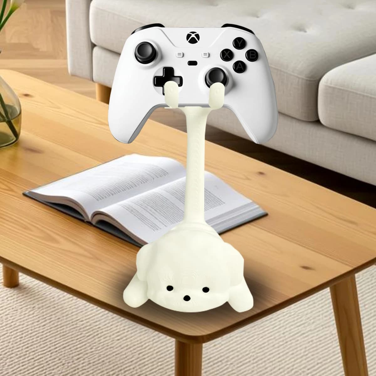 Un simpatico supporto da gioco a forma di gatto, compatibile con PS5/PS4/Xbox/Switch, realizzato in plastica e non facile da rompere