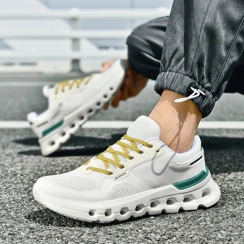 Le scarpe da corsa da uomo sono scarpe sportive leggere, traspiranti e casual. Scarpe da corsa da esterno alla moda e ammortizzanti