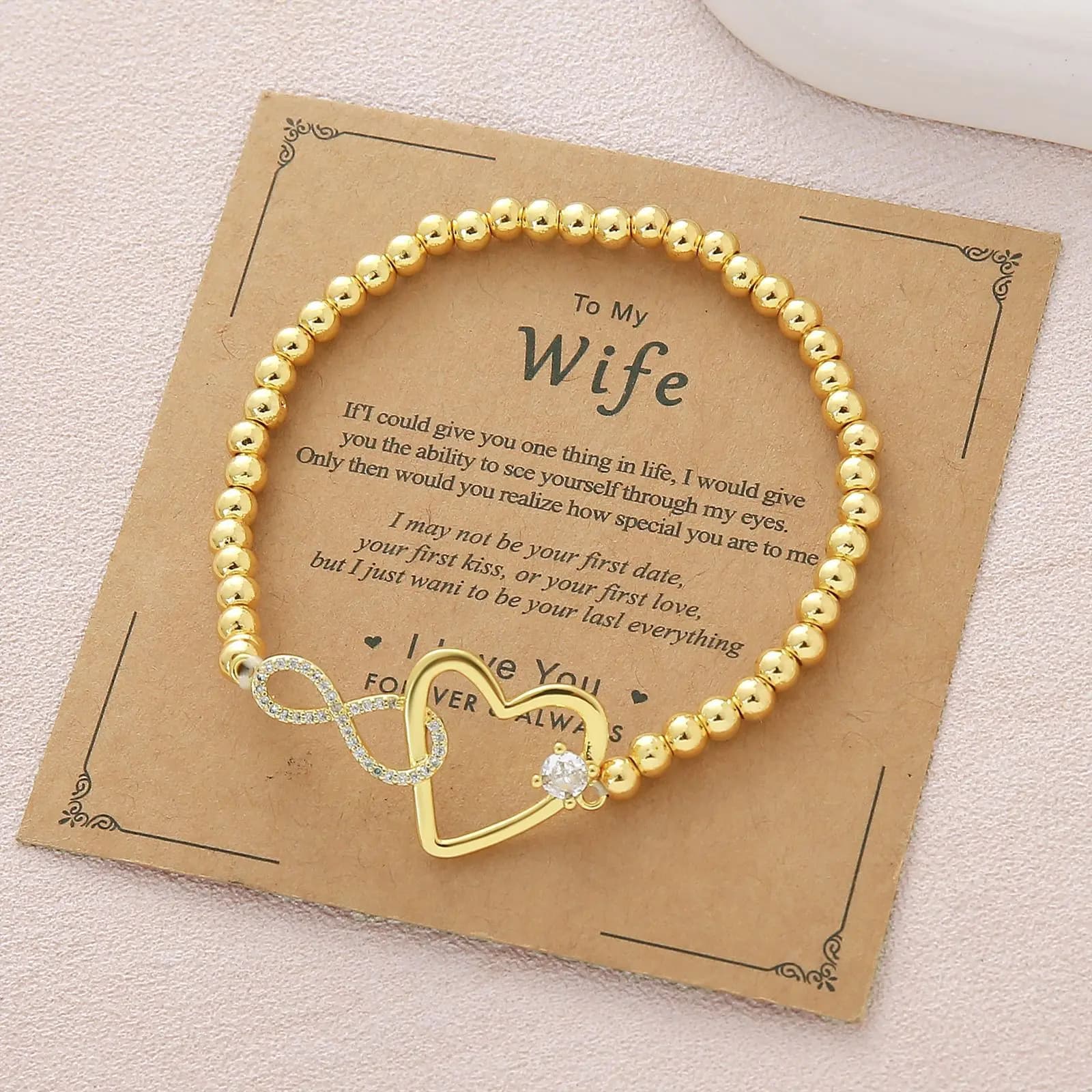Bracciale con perline d'amore in oro 18 carati placcato in rame Anello geometrico a forma di cuore da donna Bracciale tutto-fiammifero Nuovo prodotto