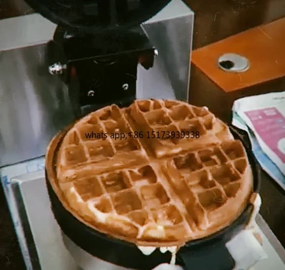 Electric waffle and cake pin, gas type, for ball-shaped waffles, with sugar-coated Haws design