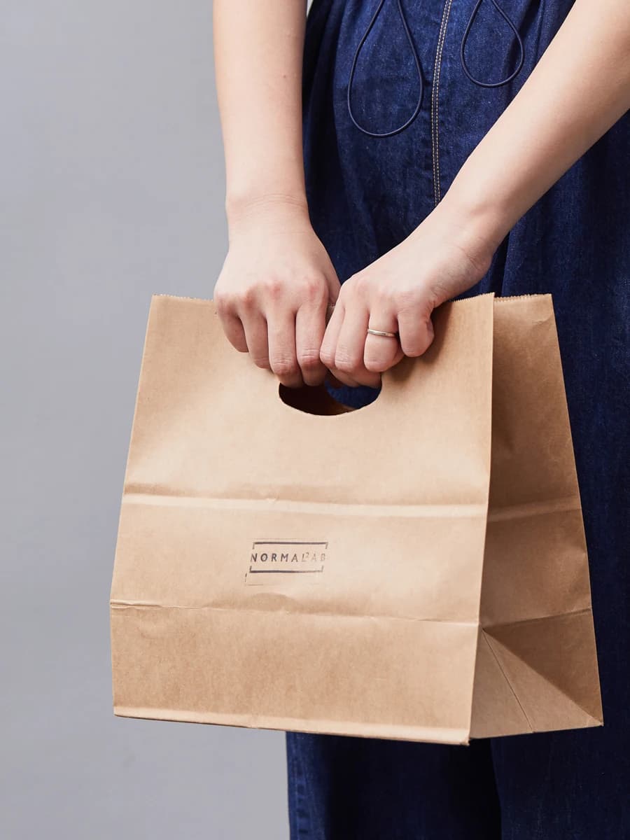 Portable thick kraft paper bag, lightweight, for food, with holes, for food packaging