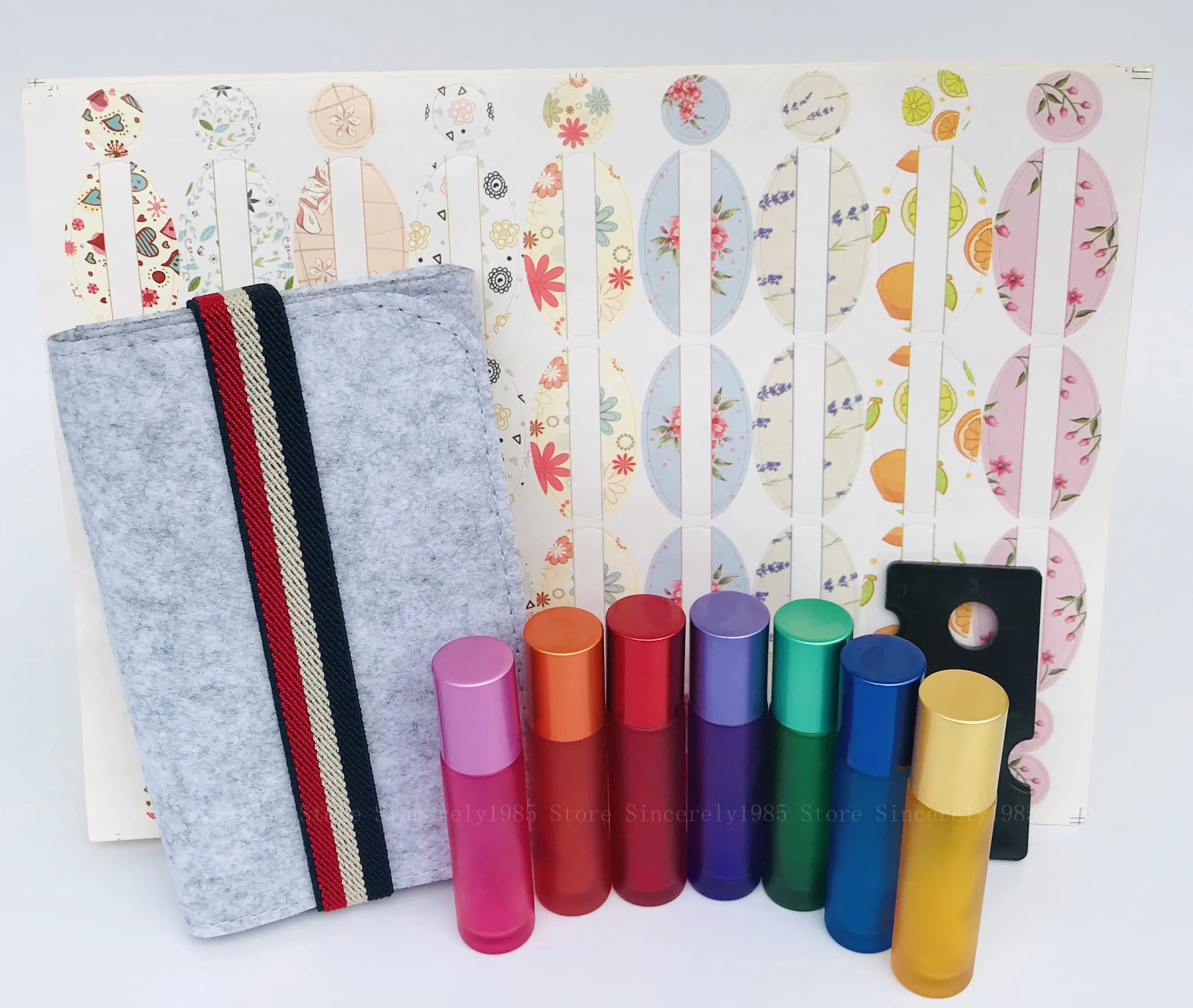 Set di 6X 7X 10ml rotolo di vetro su bottiglie profumo oli essenziali Roller Ball con sacchetto di immagazzinaggio/adesivo/chiave olio aromaterapia