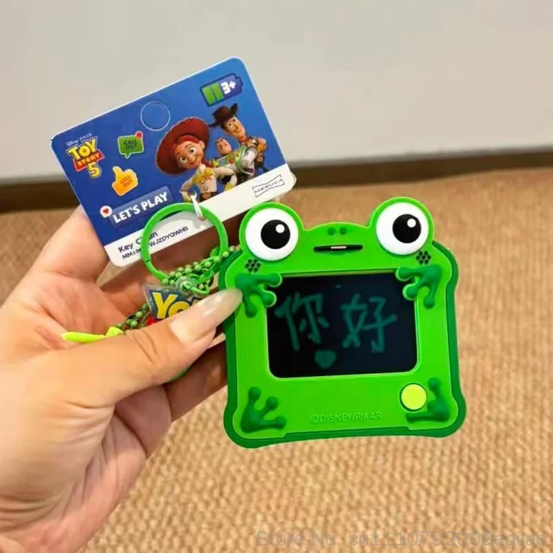 Hot Genuine Toy Story 5 Lilypad Lcd Tablet Keychain Erasable Drawing Toy Puzzle Drawing Erasable Handwritten Backpack Pendant