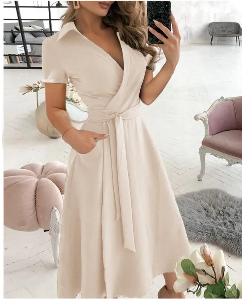 Abito midi da donna a maniche corte con scollo a V, cintura annodabile e tasche laterali, ideale per occasioni casual, feste e serate.