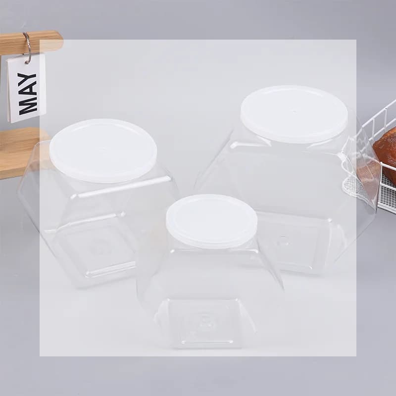 Barattolo di biscotti per caramelle esagonale trasparente portatile Imballaggio in plastica sigillato con coperchio Contenitore per alimenti Forniture da cucina