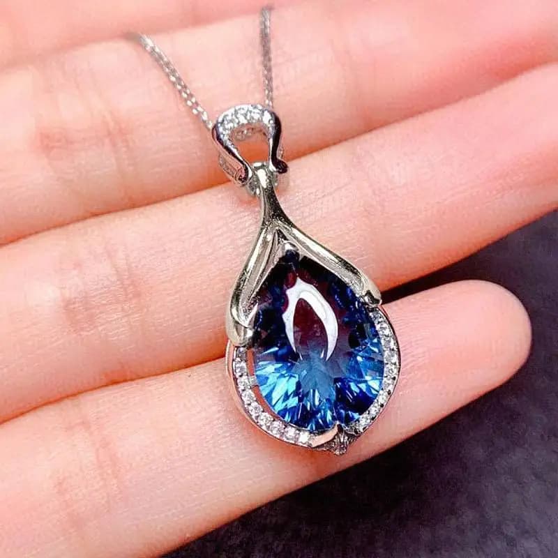 Huitan Elegant necklace with special pendant for women with inlays in bright blue CZ, fashionable accessories for parties, charming jewelry for wedding gifts