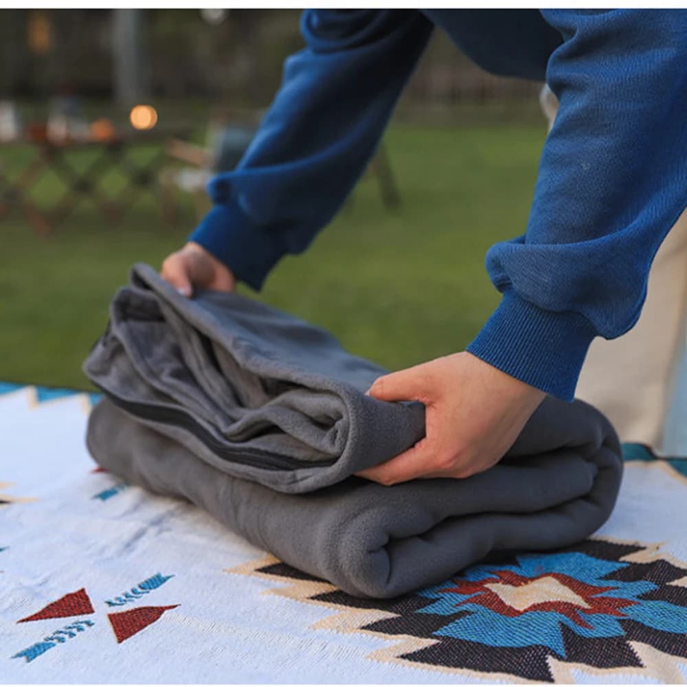 Ultralight double-sided fleece bag for adults, ideal for travel, hotel, camping, or as a rest blanket.