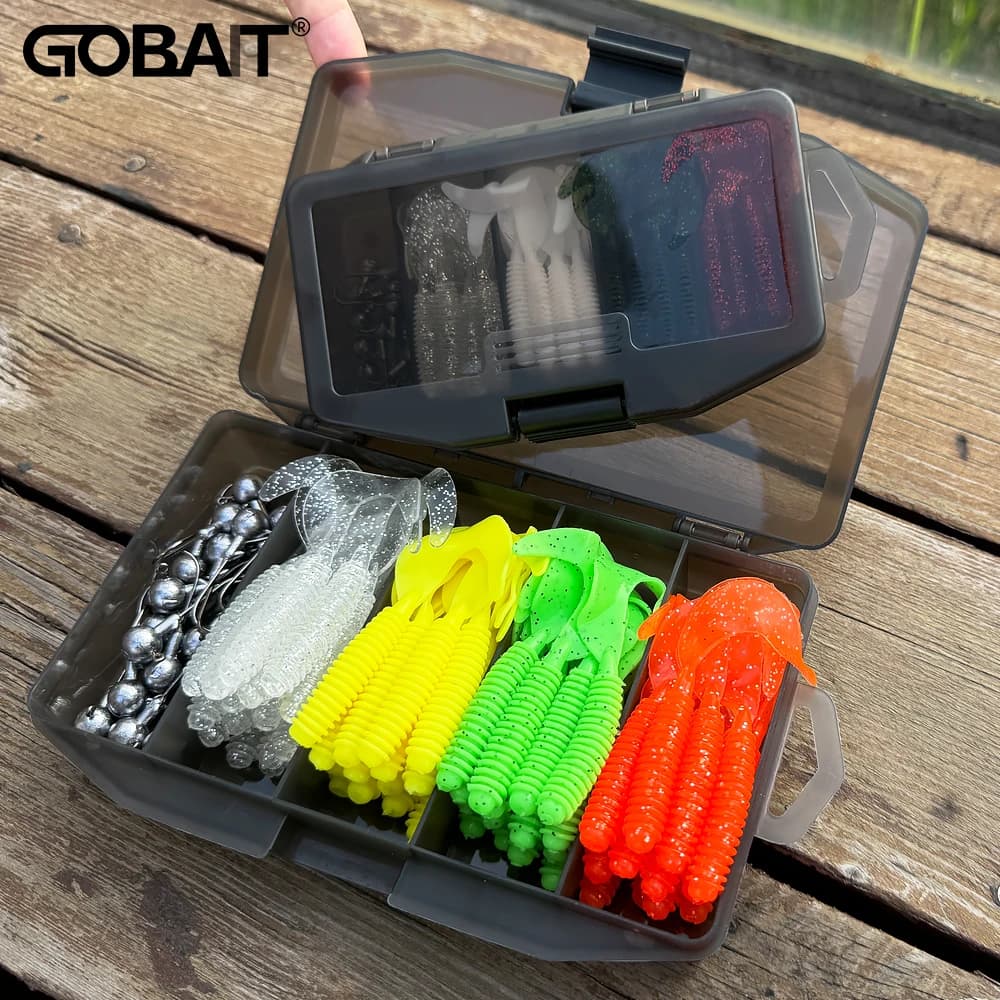GOBAIT 50PCS T Coda Grub Verme Richiamo Morbido 5cm 6cm 7cm Metallo Jig Bait 2g 5g 7g Jigging Testa Gancio Attrezzatura da pesca Scatola Pesca Swimbait