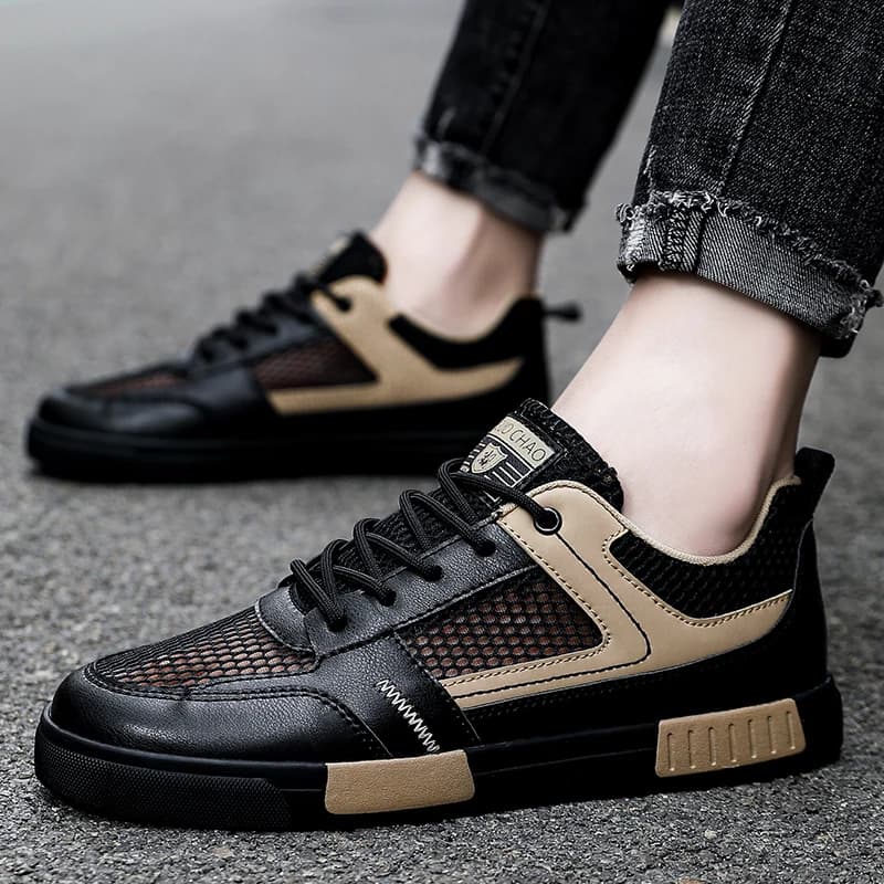 Scarpe da skateboard primavera estate nuovi da uomo Scarpe da ginnastica casual piatte traspiranti cave Calzature da corsa da passeggio bianche nere da studente